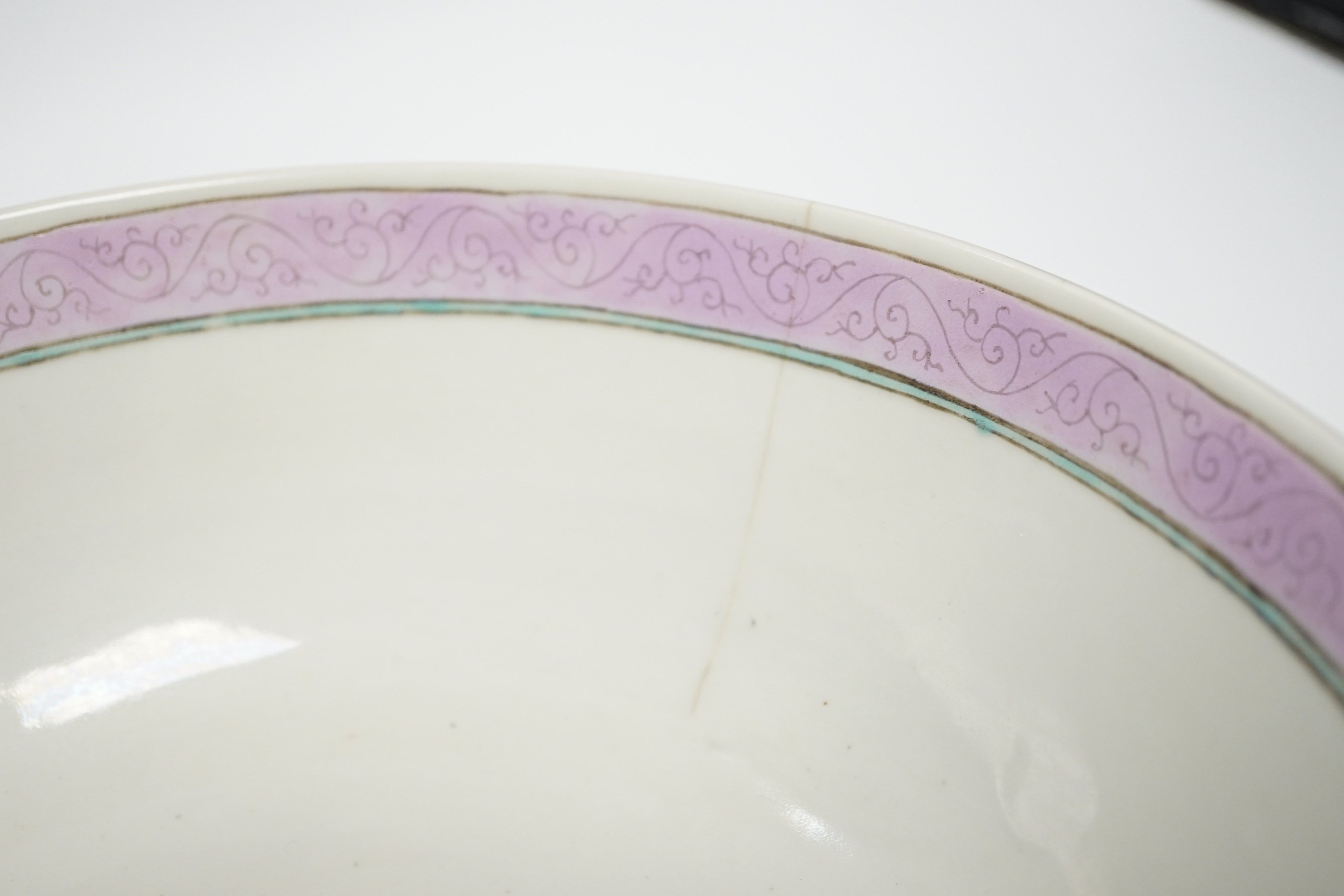 A 19th century Chinese famille noire bowl, 26cm diameter